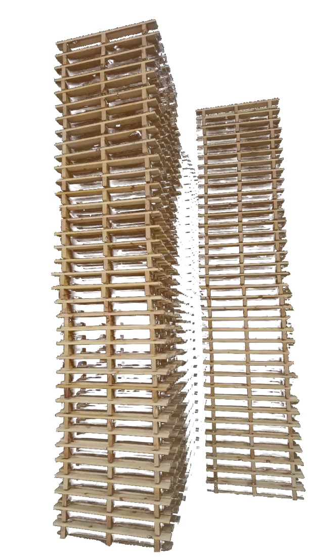 Stacks of D.A.K heat treated wooden pallets
