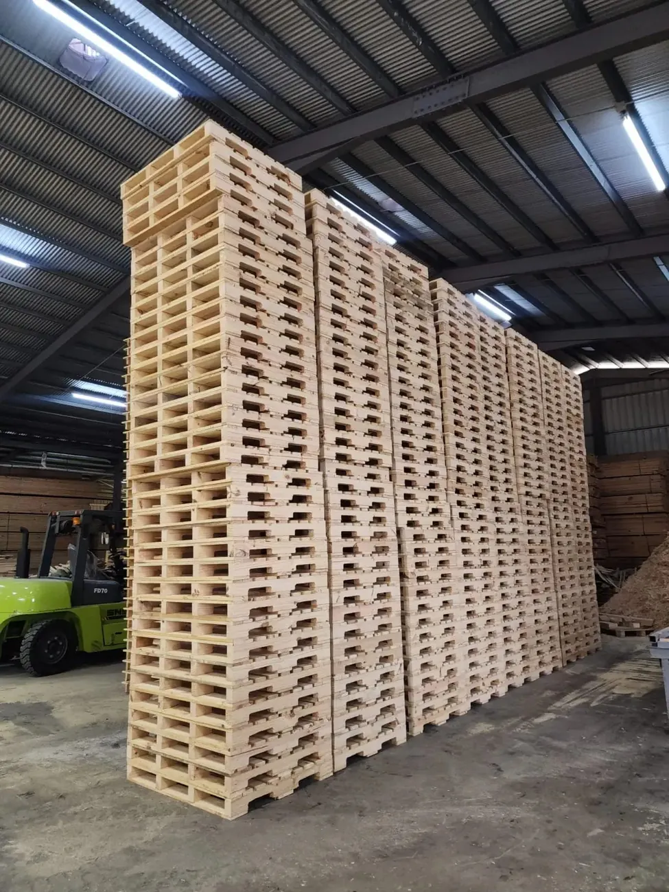 Wall of finished pallets in the D.A.K warehouse